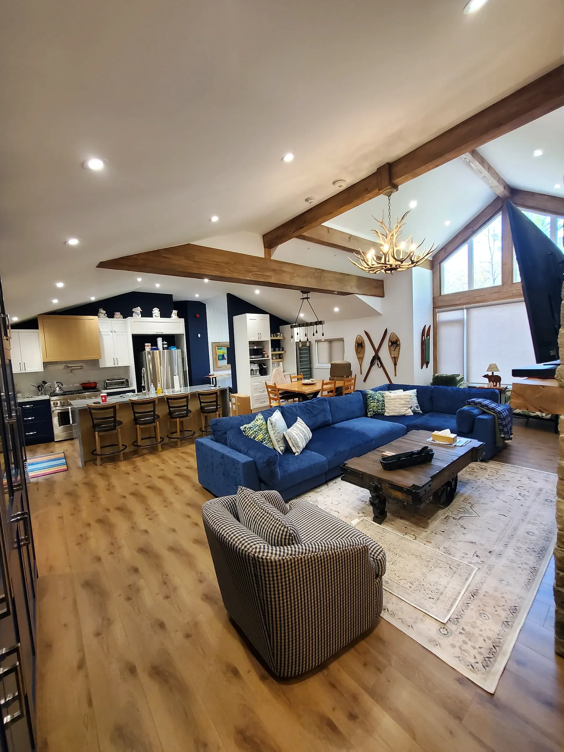 Open-plan Ferreira kitchen and living space with custom finishes